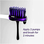 Purple teeth whitening toothpaste on a toothbrush with instructions to brush for 2 minutes.