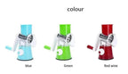 Hand-cranked vegetable slicer and grater available in blue, green, and red wine colors.